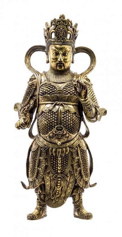 Appraisal: A Gilt Bronze Figure of Virapaksa Guang Mu Tian Wang