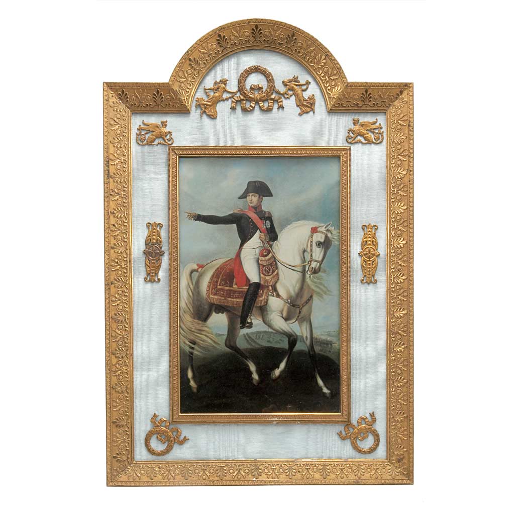 Appraisal: Empire Style Gilt-Metal Photograph Frame Of arched rectangular form decorated