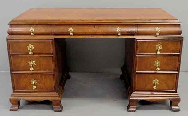 Appraisal: Kittinger Chippendale style mahogany executive desk with a highly figured