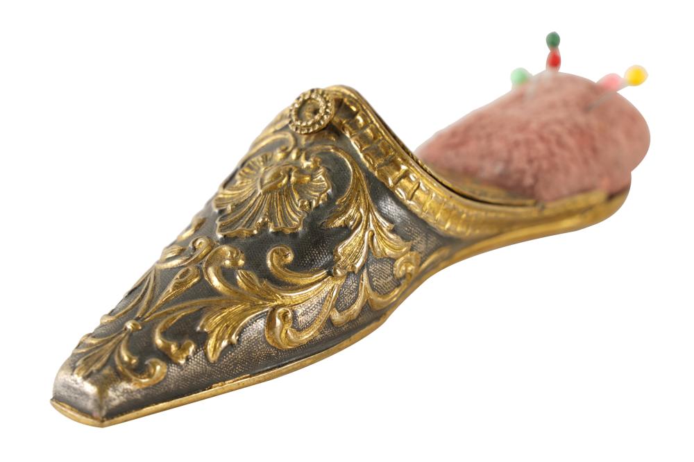 Appraisal: GILT SILVERED METAL SHOE-FORM NECESSAIREthe hinged lid opening to a