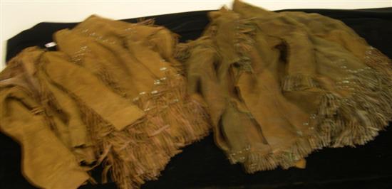 Appraisal: Two leather riding outfits consisting of two leather fringed jackets