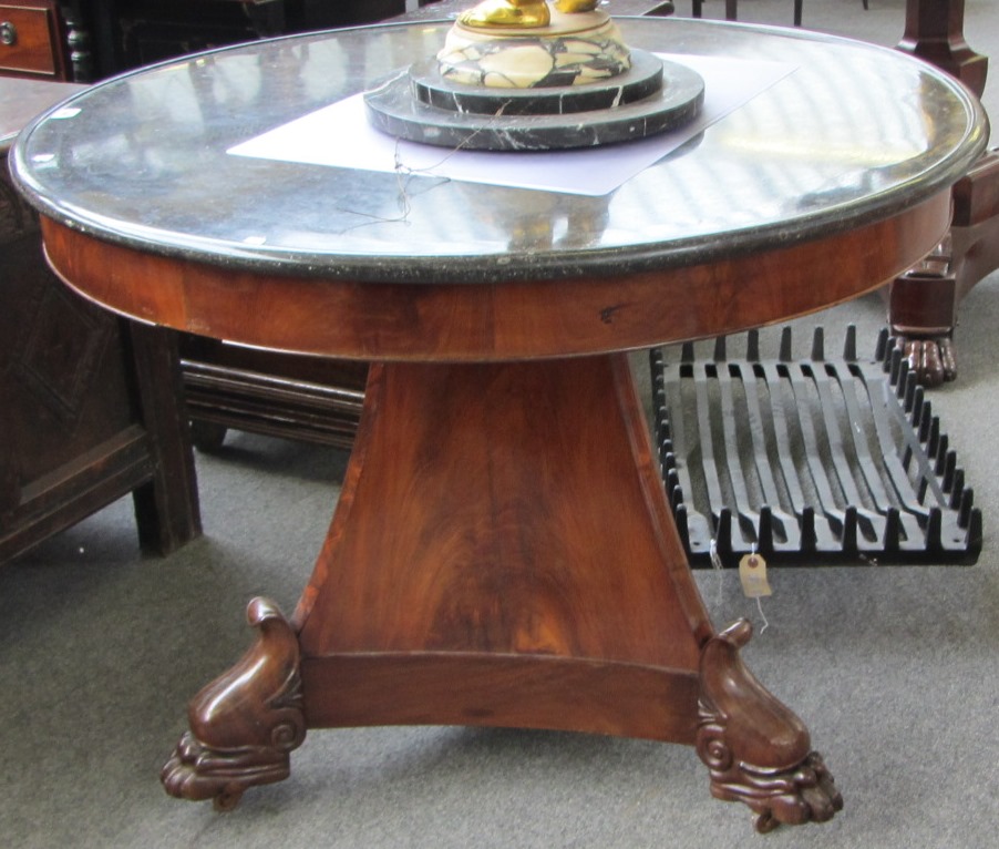 Appraisal: A Restoration mahogany gueridon the dished circular marble top on