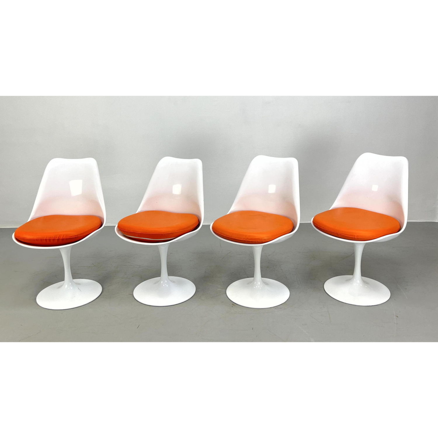 Appraisal: Set Tulip style Dining Chairs Pedestal Base Chairs Orange Seat