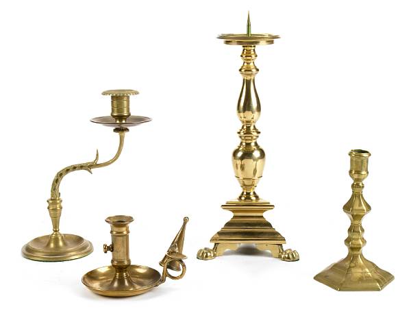 Appraisal: A group of three pairs of brass candlesticks and a