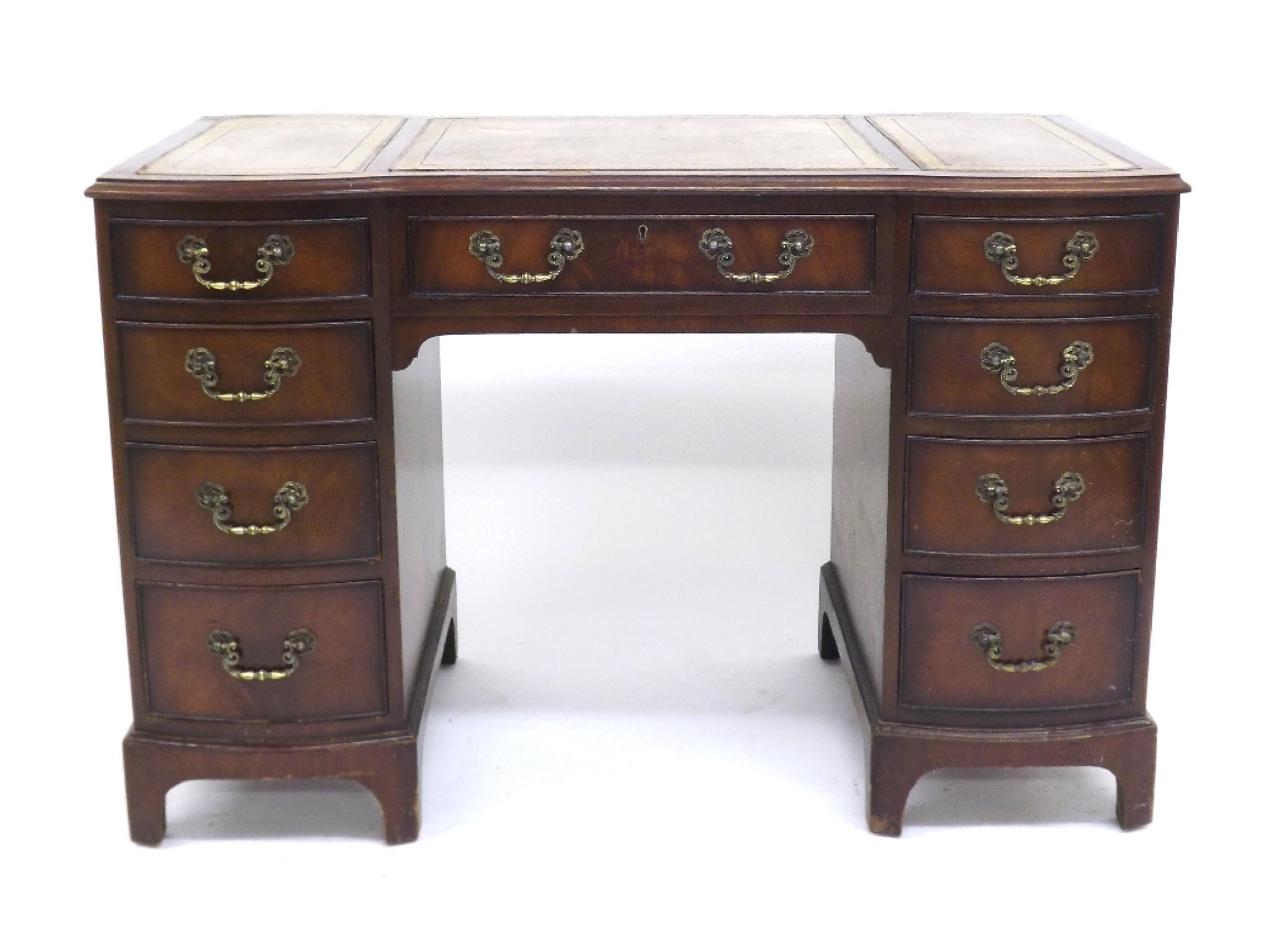 Appraisal: Mahogany twin pedestal break bowfront desk fitted with an arrangement