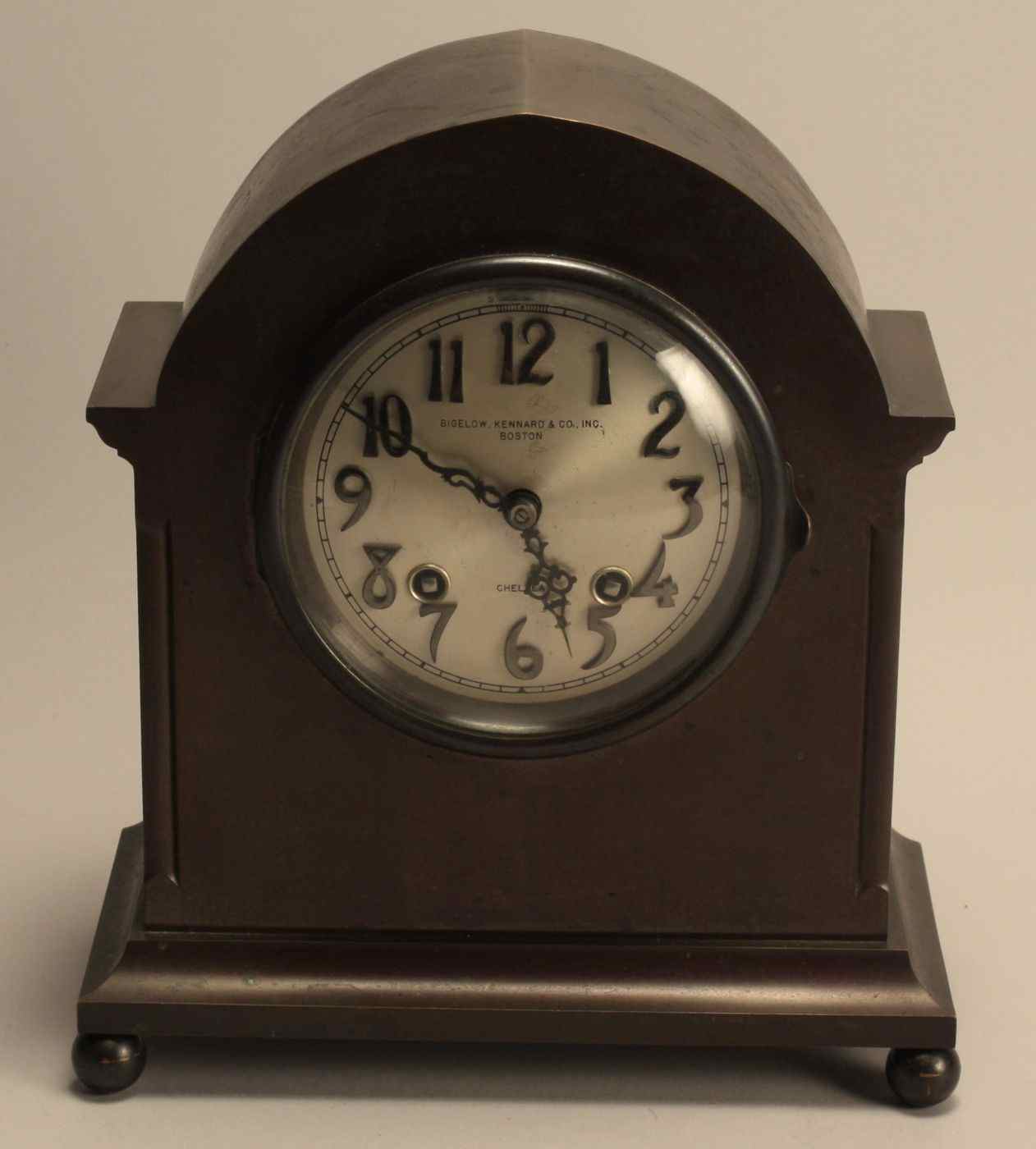 Appraisal: CHELSEA BRASS MANTEL CLOCKWith an arched top Metal face with