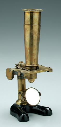 Appraisal: Brass microscope cast brass with cast iron base adjustable stage