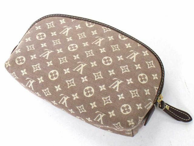 Appraisal: Louis Vuitton cosmetic pouch in mini Lin monogram canvas with