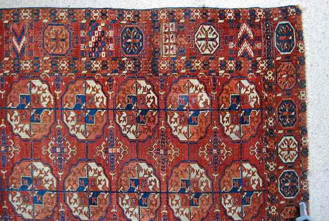 Appraisal: A TEKKE MAIN CARPET mid th Century with six rows