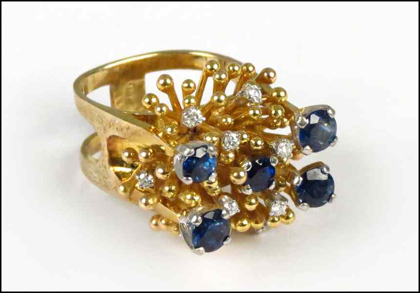 Appraisal: SAPPHIRE DIAMOND AND KARAT YELLOW GOLD RING Stamped ''Larry'' grams