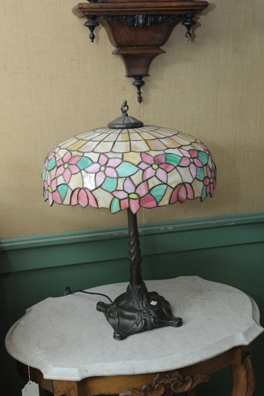 Appraisal: TABLE LAMP Foliate molded base having a leaded and stained