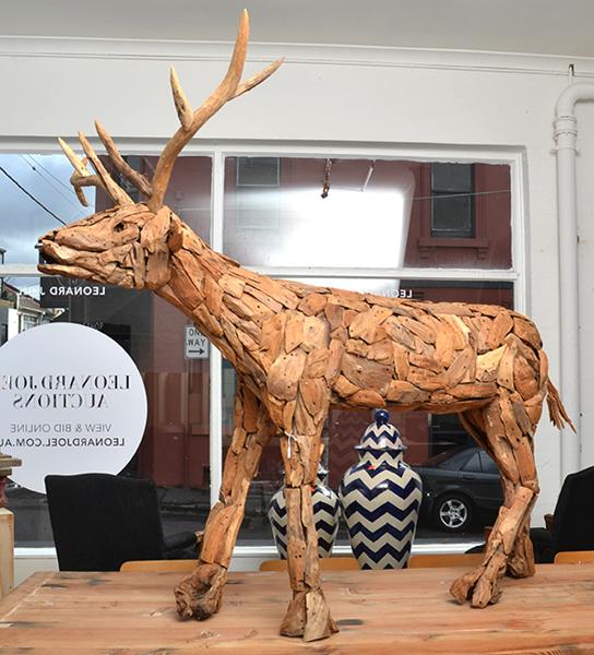 Appraisal: LARGE INDONESIAN HAND CRAFTED WOODEN REINDEER cm high LARGE INDONESIAN