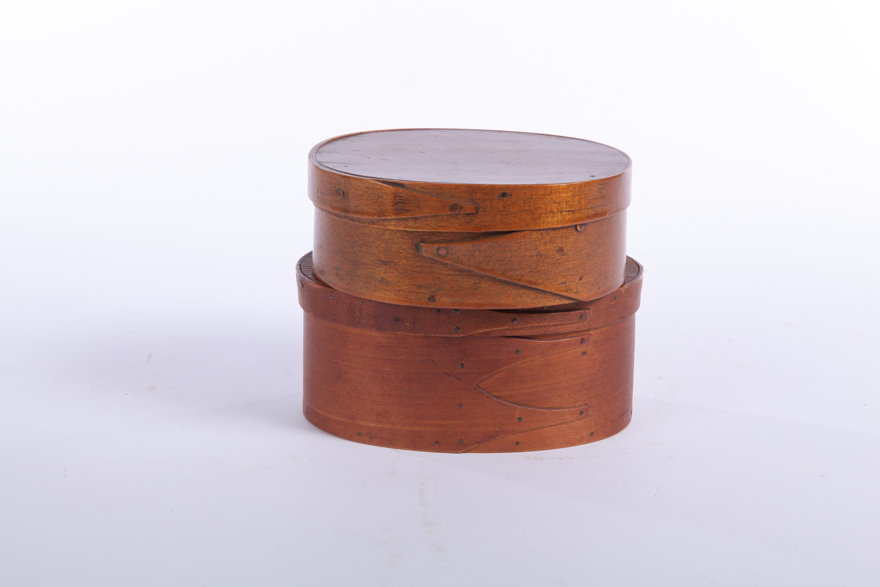 Appraisal: TWO SHAKER BOXES Late th century Oval bentwood with copper