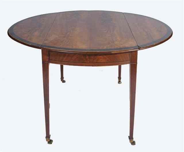 Appraisal: A GEORGE III OVAL MAHOGANY PEMBROKE TABLE with crossbanded top