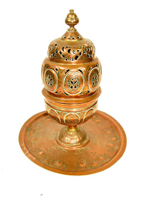 Appraisal: A Near Eastern copper incense burner the pierced and decorated