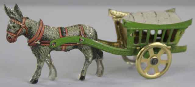 Appraisal: DONKEY WAGON PENNY TOY Germany attributed to Fischer lithographed tin