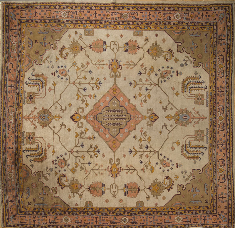 Appraisal: OUSHAK CARPET The cream ground worked with salmon and camel's