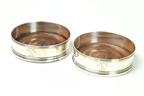 Appraisal: PAIR OF ENGLISH SILVER WINE COASTERS London hallmarks for Henry