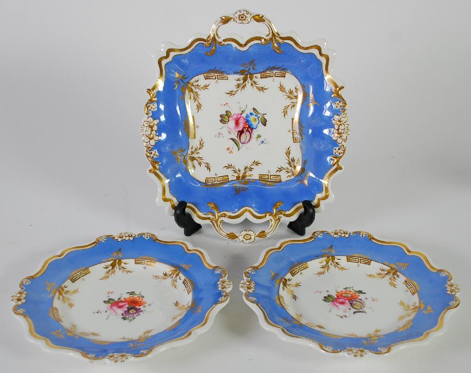 Appraisal: PAIR OF NINETEENTH CENTURY ENGLISH PORCELAIN DESSERT PLATES polychrome painted