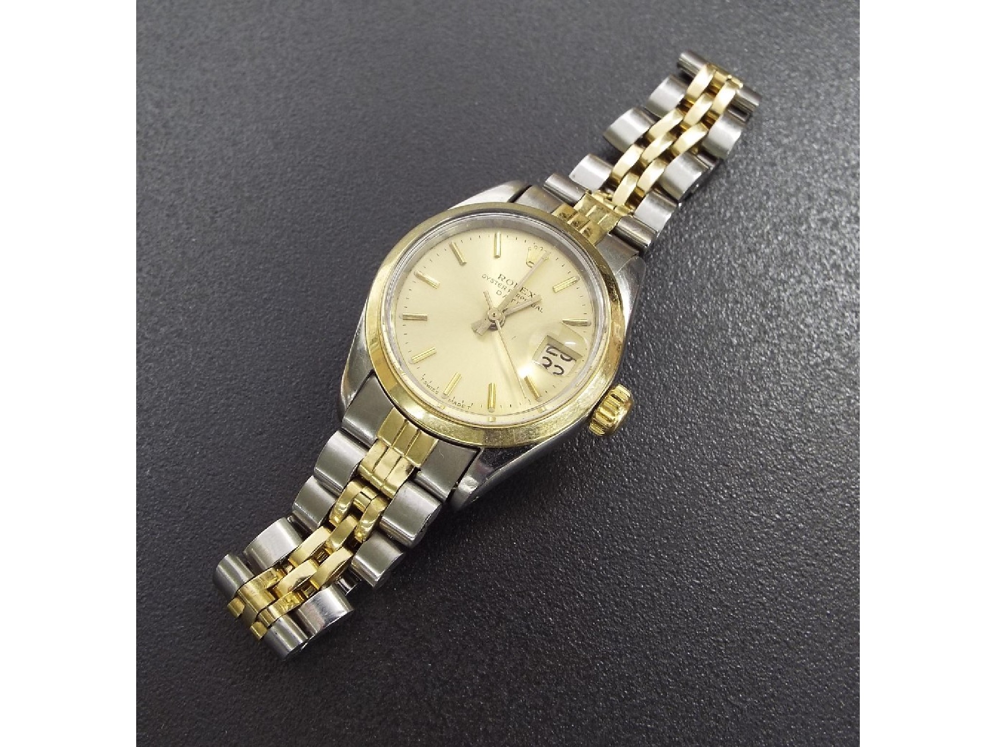 Appraisal: KFKJQ Rolex Oyster Perpetual Date lady's gold and steel bracelet