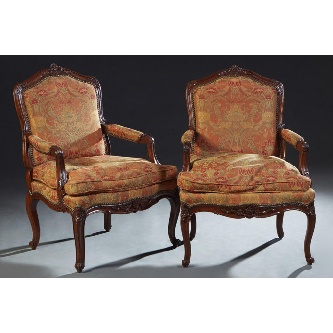 Appraisal: Pair of French Louis XV Style Carved Mahogany Fauteuils th