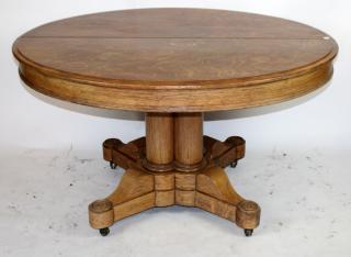 Appraisal: American round oak pedestal table with leaves h x w