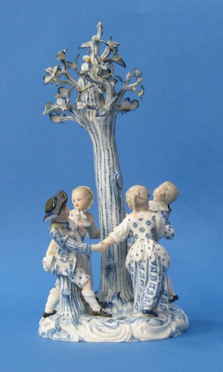 Appraisal: A LATE MEISSEN TABLE CENTREPIECE modelled as four children dancing