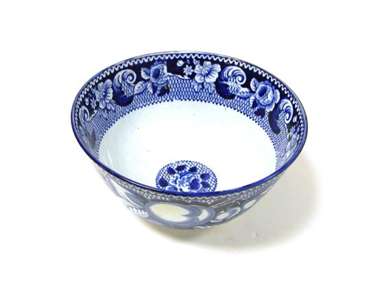 Appraisal: English soft paste transferware bowl th C blue decoration of