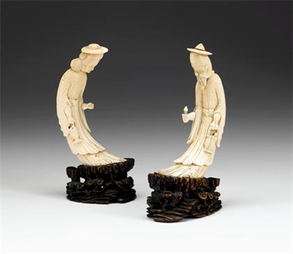 Appraisal: Pair of Chinese elephant ivory figures th century Of strong