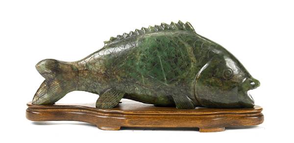 Appraisal: An archistic style spinach jade figure of a carp length