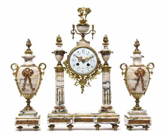 Appraisal: A Louis XVI Style Marble and Gilt Metal Mounted Clock