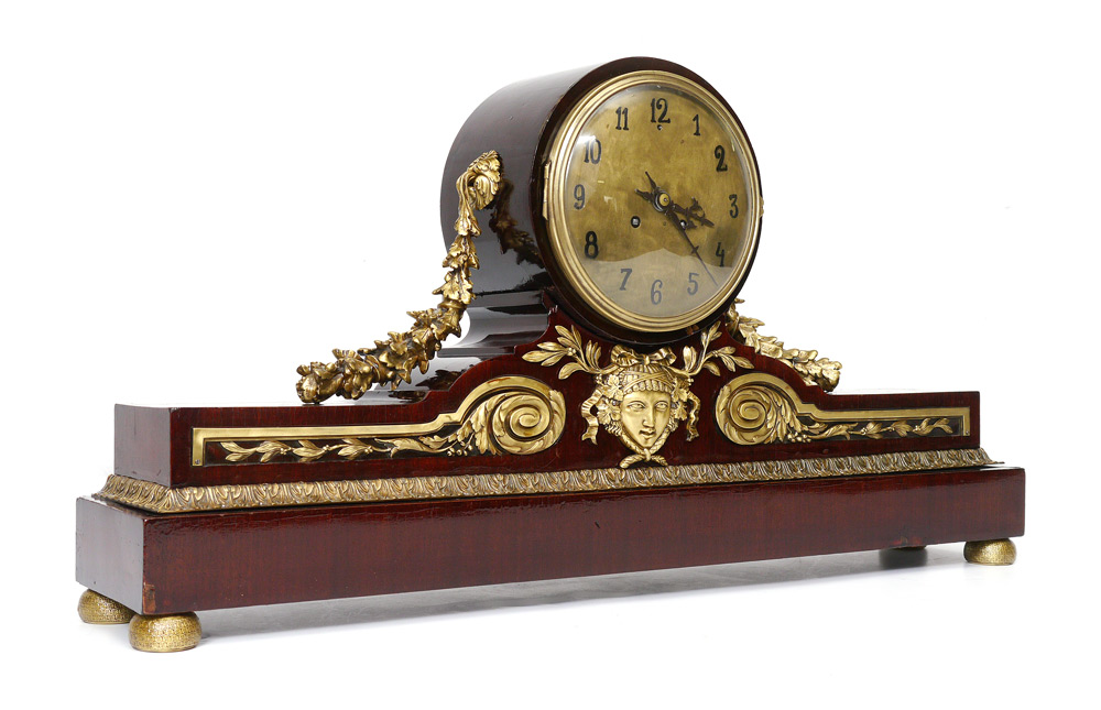 Appraisal: ORMOLU AND MAHOGANY CONTINENTAL MANTLE CLOCK Mahogany veneer case and