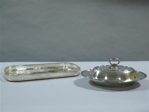 Appraisal: A SILVERPLATED DRINKS TRAY Of oblong form with pierced gallery