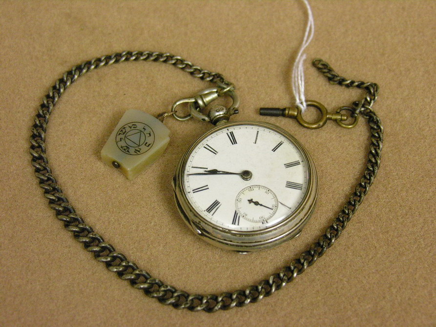 Appraisal: HALLMARKED KEY WIND WATCH WITH FOB Engraved inside the back