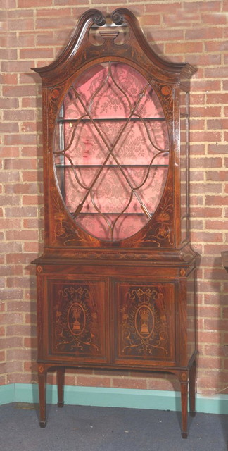 Appraisal: AN EDWARDIAN MAHOGANY AND SATINWOOD MARQUETRY INLAID VITRINE IN TWO