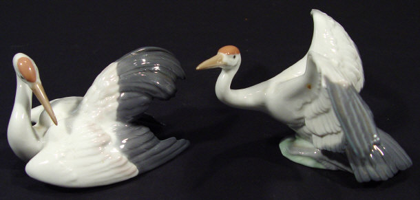 Appraisal: Two Lladro porcelain cranes with hand painted decoration printed factory