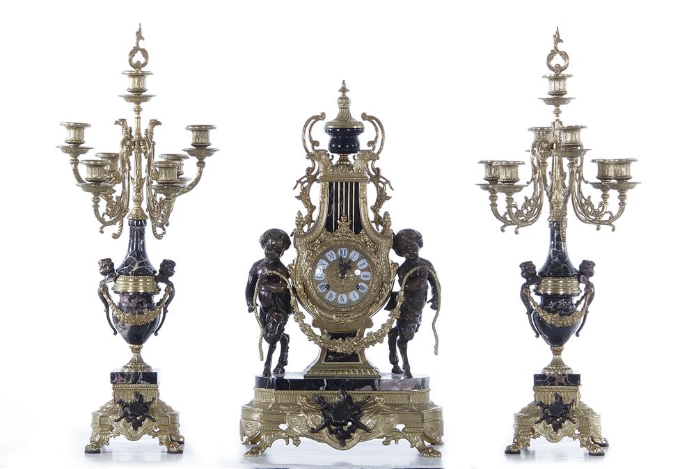 Appraisal: Ormolu-mounted clock garniture Franz Hermele Clock Co Wurttemberg Germany -