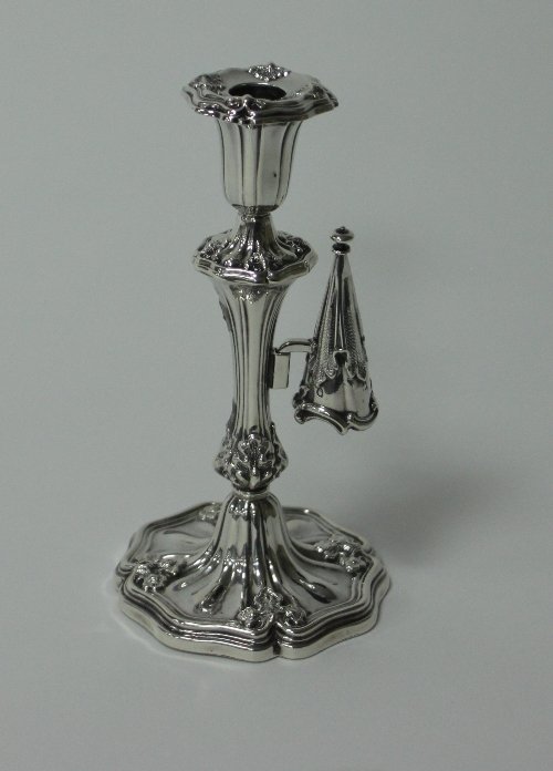 Appraisal: A Victorian silver candlestick and snuffer Henry Wilkinson and Co