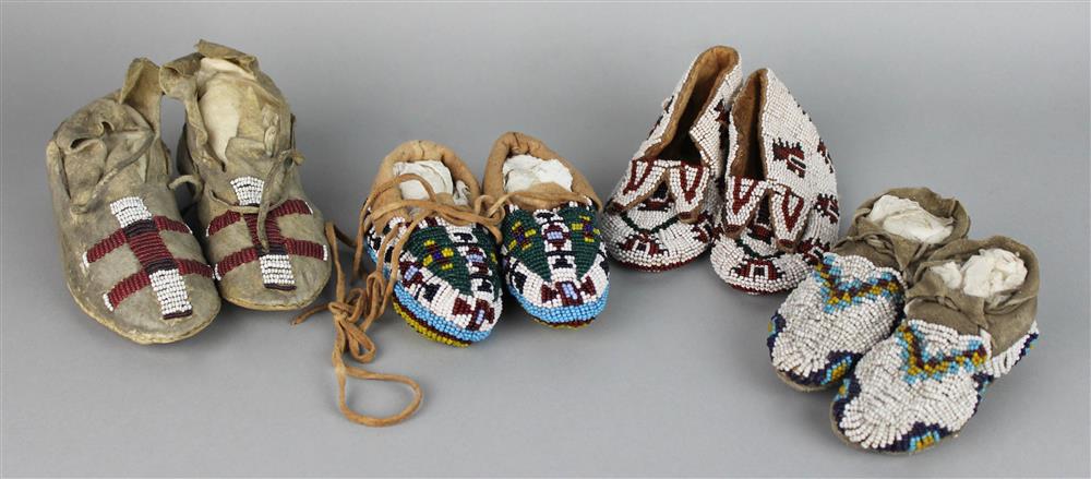 Appraisal: FOUR PAIRS OF PLAINS CHILD'S MOCCASINS two pairs fully beaded