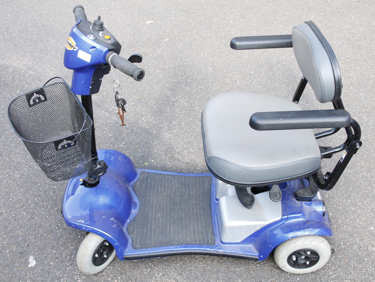 Appraisal: A Strider four wheeled mobility scooter in blue and black