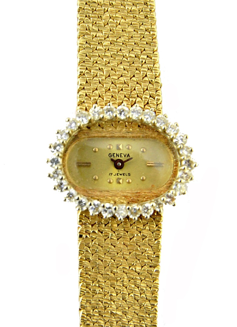 Appraisal: A lady's gold and diamond set Geneva bracelet wristwatch with