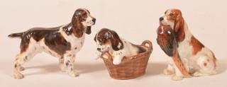 Appraisal: Royal Doulton Cocker Spaniel Figurines Three Various Royal Doulton Porcelain