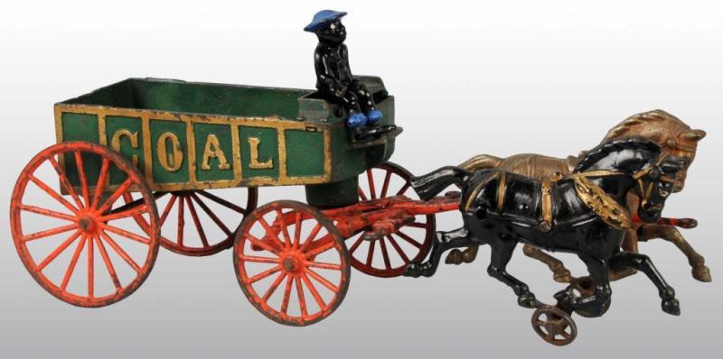 Appraisal: Cast Iron Hubley Horse-Drawn Coal Wagon Toy Description Pulled by