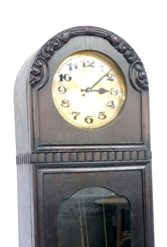 Appraisal: A late thC stained pine longcase clock the arched top