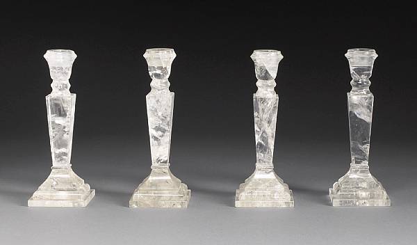 Appraisal: A set of four Neoclassical style rock crystal candlesticks Each