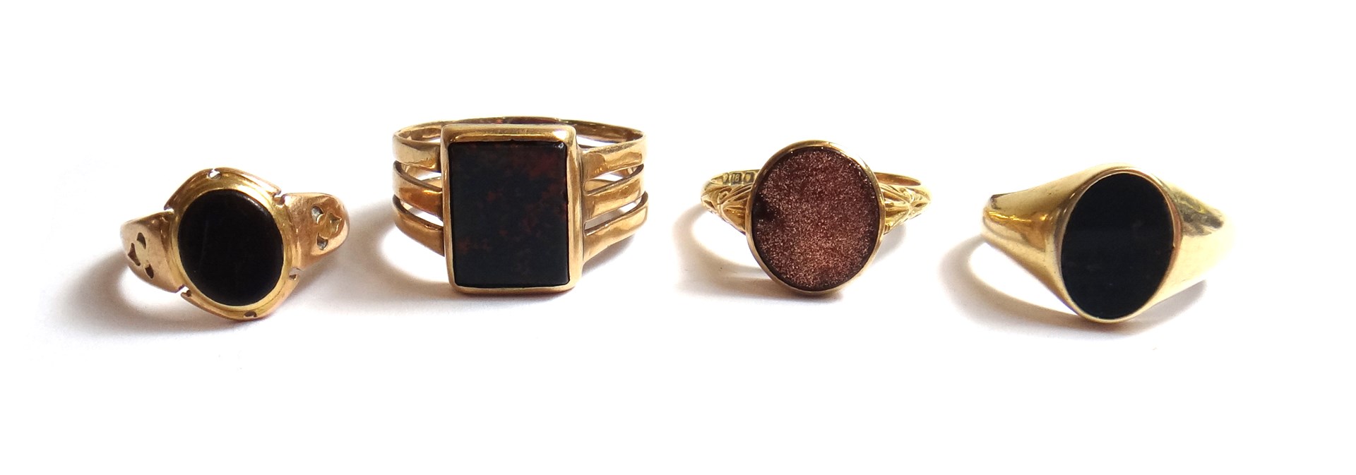 Appraisal: A gold and bloodstone set oval signet ring a gold