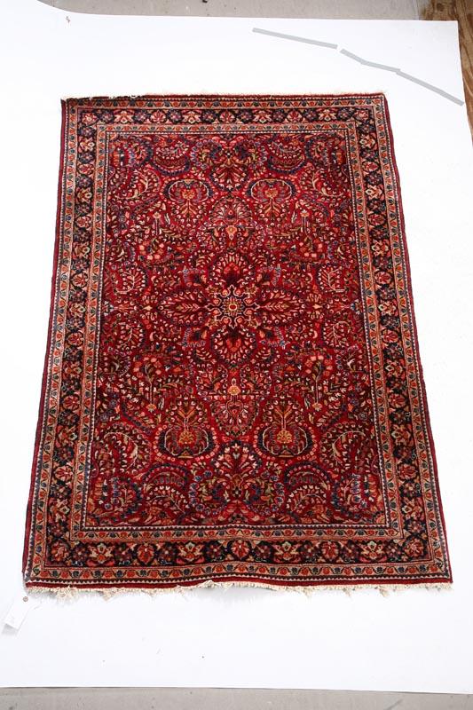 Appraisal: ORIENTAL RUG Sarouk ca s Burgundy ground ' x '