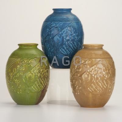 Appraisal: ROOKWOOD Three production vases with fish Flame mark XXXI Each