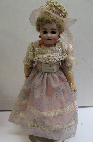 Appraisal: GERMAN DEP BISQUE HEAD GIRL DOLL in mold bisque socket