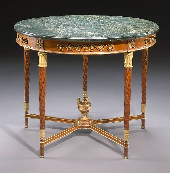 Appraisal: A Louis XVI style gilt bronze mounted center table modern